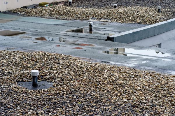 Tar And Gravel Roof Repair in Cary
